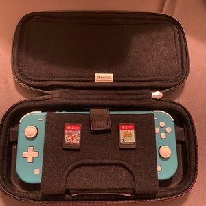 Nintendo switch with charger and case and 2 games Mario kart and animal crossing